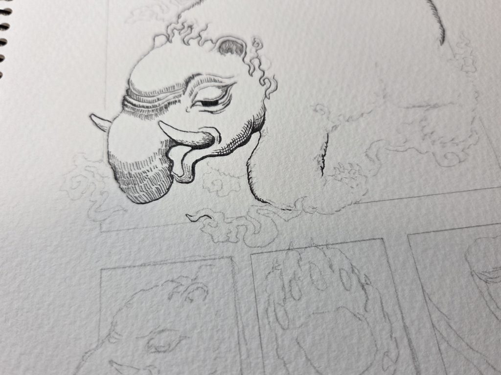 洋伯が万年筆で妖怪獏のペン画を描きはじめたイラスト制作中の写真