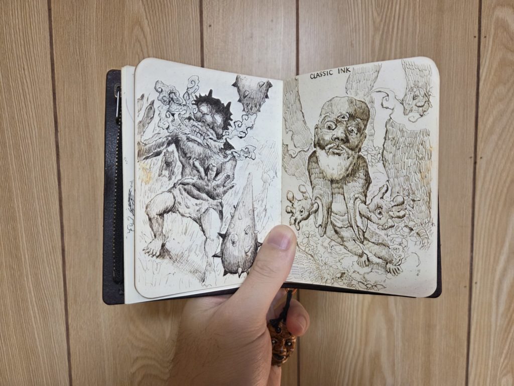 yamamoto paperのro-biki noteに描いたペン画スケッチ　妖怪が描いてある