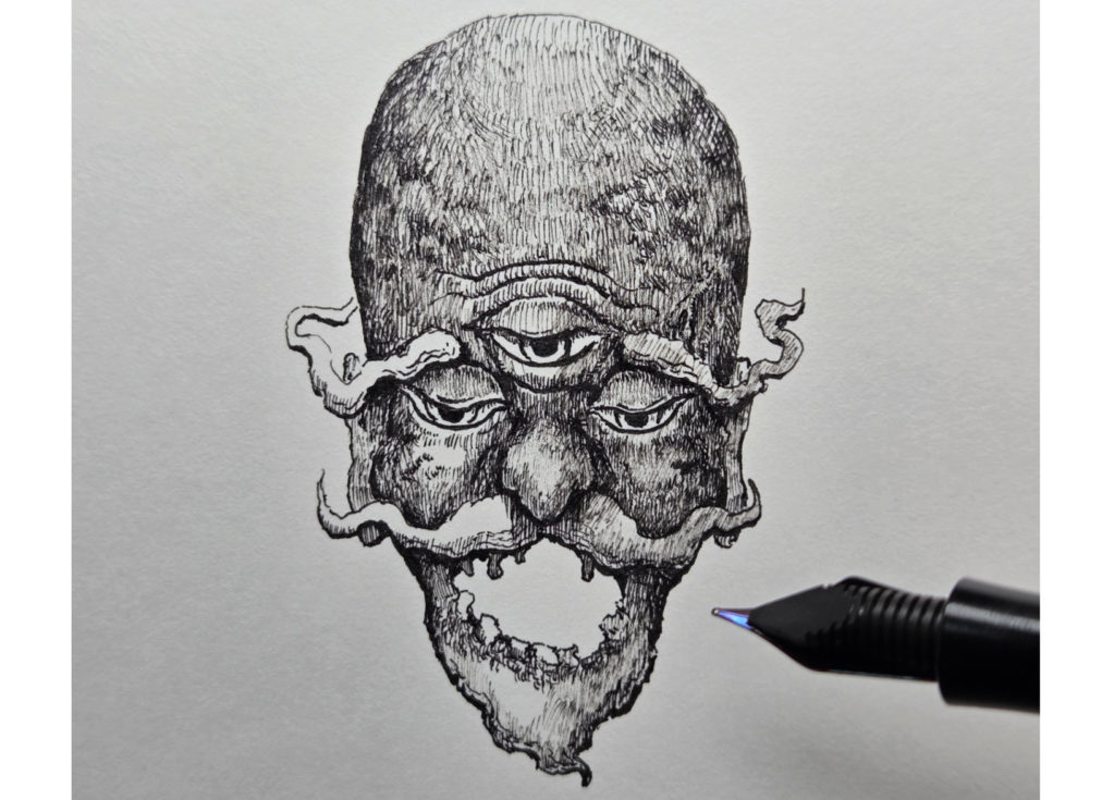 万年筆で描き始めた妖怪海の怪のイラストの模様や色を足していく