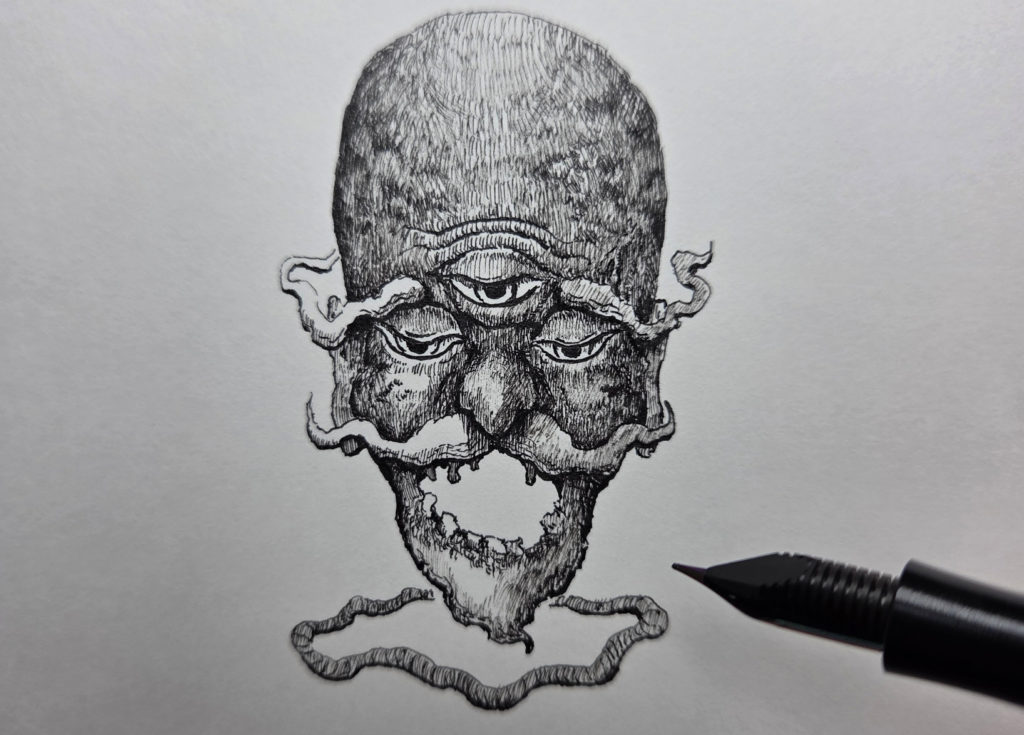 万年筆で描き始めた妖怪海の怪のイラストの下にしめ縄を描いて色をつけていく