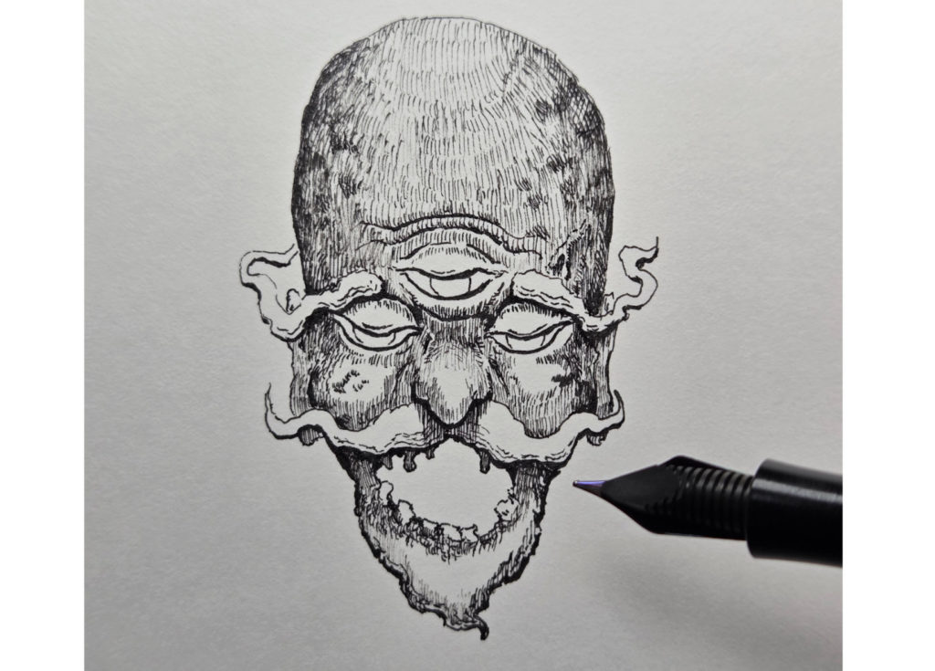 万年筆で描き始めた妖怪海の怪のイラストの模様や色付け