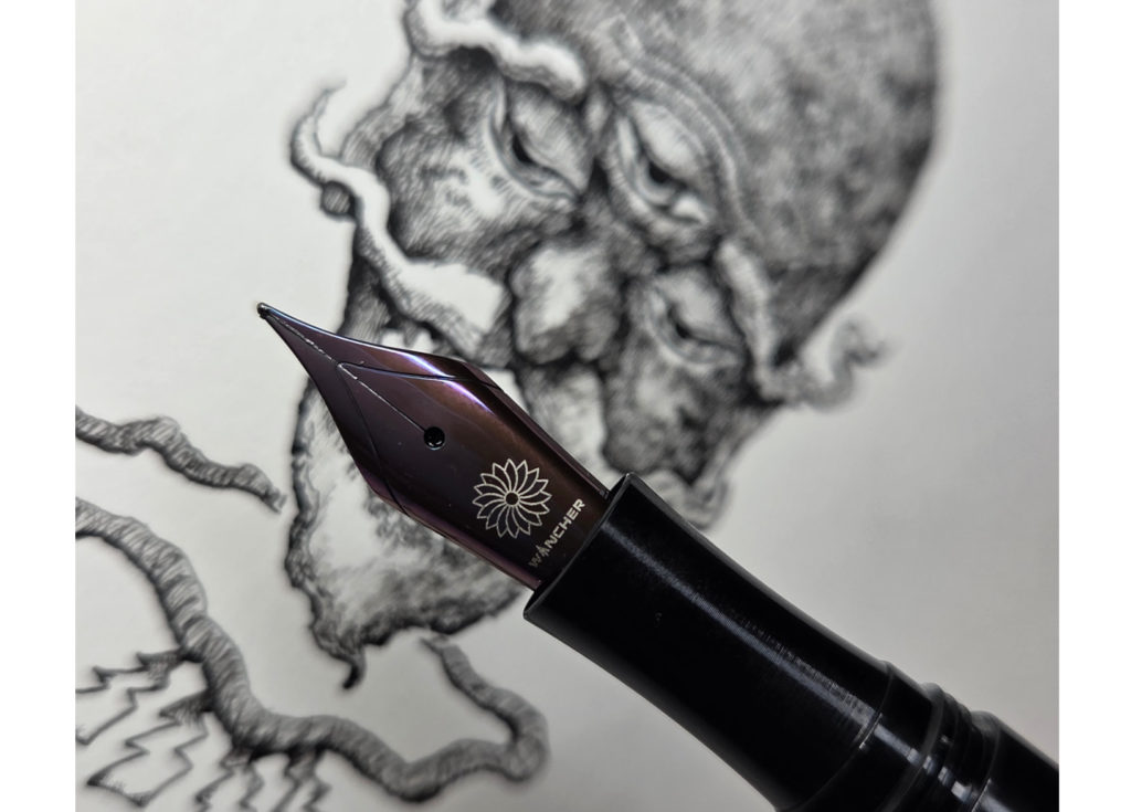 万年筆で描いた妖怪海の怪を描いた万年筆の写真